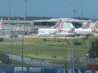 Brisbane International Airport, Brisbane, Queensland Australia (YBBN) - lots of virgins at domestic terminal - viewed from international terminal. - by magnaman