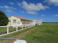 Ruawai Aerodrome - Clubhouse and single hangar at Ruawai.  - by magnaman