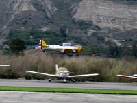 Santa Paula Airport (SZP) - Condor Squadron making another high speed flour bombing pass at riverbed target Commemorating the 7 Dec. 1941 attack on Pearl Harbor. - by Doug Robertson