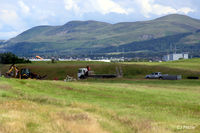 Edinburgh Airport, Edinburgh, Scotland United Kingdom (EGPH) - The final departure of Fokker F.27 TC-MBG from EGPH. The scrapmen pick up the final pieces of this wrecked aircraft that has sat on the northern side of the airport for some time. - by Clive Pattle