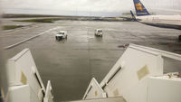Keflavík International Airport (Flugstöð Leifs Eiríkssonar) - Hanging out the back door of a 767. Had to make unexpected landing at Keflavik on an Air Canada flight. So while we waited, stuck on the plane ... - by Remi Farvacque