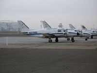 Metropolitan Oakland International Airport (OAK) - Ameriflight PA-31 Navajos getting ready for the daily mail runs up and down Northern and Central California (Ameriflight now operates out of KHWD a few miles south of KOAK) - by Steve Nation