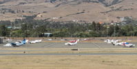 Reid-hillview Of Santa Clara County Airport (rhv) - The busiest time you'll ever see the south tie downs at Reid Hillview Airport, San Jose, CA. Photo taken from the control tower. - by Chris Leipelt