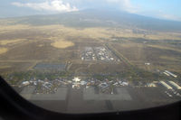 Kona International Airport, Kailua-Kona, Hawaii United States (PHKO) - Kailua-Kona airport and Mauna Kea (taken from N805HC of Ohana) - by Micha Lueck