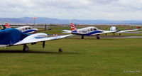 Dundee Airport, Dundee, Scotland United Kingdom (EGPN) - Some of the currently based Tayside Aviation aircraft on the grass dispersal at Dundee Riverside EGPN - by Clive Pattle