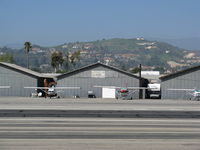 Santa Paula Airport (SZP) - Tin hangars on north side of Santa Paula Airport (Ventura County), CA with hilltop in background - by Steve Nation