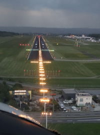 Bodensee Airport, Friedrichshafen Germany (EDNY) - Approach to land on runway 06 in the late evening - by Jean M Braun