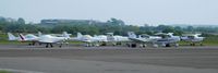 Swansea Airport, Swansea, Wales United Kingdom (EGFH) - Group photo of 9 (out of the 12) visiting D-registered aircraft.  - by Roger Winser