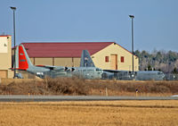 Schenectady County Airport (SCH) - Schenectady County Airport shares runways with the Stratton Air National Guard Base.  The Hercules in the foreground is part of the Antarctic Expedition. - by Daniel L. Berek