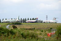 Norwich International Airport, Norwich, England United Kingdom (EGSH) - Storeage area at Norwich with I-BIXE, 5N-MJA and P4-GIU shown.  - by Graham Reeve