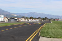Santa Paula Airport (SZP) - View of Rwy 04 from end right side overrun. 2,713 ft by 60 ft, paved, good condition, Elev, 243'. Use right hand pattern for 04. No straight in approaches. Grass short Runway 04 Right, 22 Left next to paved runway is well kept option for taildraggers. - by Doug Robertson