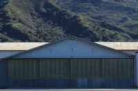Santa Paula Airport (SZP) - 33 CESSNA TAXI. The Joe Krybus Aviation BUCKER build hangar. Bucker Jungmeisters and Jungmanns are built to order here with Joe's acknowledged finest, most complete plans and workmanship. - by Doug Robertson