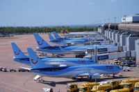 Manchester Airport, Manchester, England United Kingdom (EGCC) - TOM MON QTR on there gates/stands on T2  - by andysantini