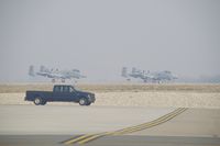 Boise Air Terminal/gowen Fld Airport (BOI) - A-10s lined up on RWY 10R for take off. Smoke filled IFR day. - by Gerald Howard