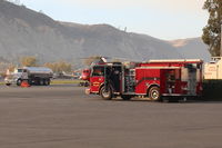 Santa Paula Airport (SZP) - Guadalupe Fire Department manned truck on duty at SZP  airport backing up the Thomas Fire fighting helicopters - by Doug Robertson