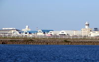 Naha Airport - Naha International Airport is Okinawa's main commercial airport. The airport is also home to Naha AB of JASDF. Nice traffic mix of commercial & military aircrafts. - by Jean M Braun