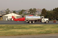 Santa Paula Airport (SZP) - N1168U 1958 Sikorsky S-58ET, Pratt & Whitney(C)PT6T-3 1,875 SHp Turbo Prop Fire Bomber, being serviced. Note smoky sky.   - by Doug Robertson