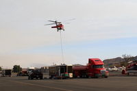 Santa Paula Airport (SZP) - N135BH 1987 Sikorsky S-70A-27 FIREHAWK, GE-T700 Series, firebomber lifting off SZP FireBase to fight Thomas Fire - by Doug Robertson
