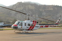 Santa Paula Airport (SZP) - N496DF 1969 BELL EH1H IROQUOIS, CAL-FIRE 902 at Thomas Fire SZP FIREBASE - by Doug Robertson