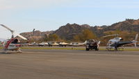 Santa Paula Airport (SZP) - N496DF Bell EH-1H TurboShaft of USDA Forest Service & N718GH 2001 Eurocopter AS 350 B3, Turbomeca Arriel 2B1TurboShaft, Restrict. class on the FireBase line - by Doug Robertson