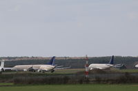 Norwich International Airport - 3 former Saudi 170s stored North Side Norwich
HZ-AEM, HZ-AEL HZ-AEE (right badly faded) - by AirbusA320