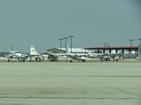 Boise Air Terminal/gowen Fld Airport (BOI) - Passengers returning from vacations in the mountains on the back country ramp. - by Gerald Howard