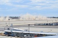 Boise Air Terminal/gowen Fld Airport (BOI) - A little dust after the take off of a DC-8. - by Gerald Howard