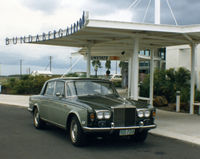 Bundaberg Airport - Bundaberg Airport YBUD Terminal Entrance on 24Dec1986. Sunstate Airlines and Air Queensland operated services to Brisbane then. (Cane farmer’s Rolls Royce ‘wheels’ optional! Price On Application?) - by Walnaus47