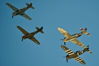 Manchester Airport - P-40s & P-47s over fly MAN during airshow. - by Gerald Howard