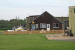 Oaksey Park Airport, Oaksey, England United Kingdom (EGTW) - Oaksey Park club house - by Chris Hall