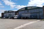 X4HP Airport - Central hangar at Hooton Park - by Chris Hall