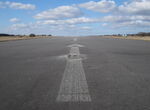 EKVL Airport - Arrows pointing to the displaced threshold of Runway 28 at the closed Vaerloese Air Base in Denmark. - by Jan Lundsteen-Jensen