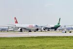 Chicago O'hare International Airport (ORD) - Swiss A333 HB-JHN arriving, Eva Air Cargo B77L B-16787 departing - by Mark Kalfas