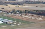 Poplar Grove Airport (C77) - New hangar homes going up on the north side - by Mark Pasqualino