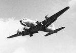 EKVL Airport - Douglas C-54 of US Marines seen on final approach to Runway 28 at Vaerloese Air Base in Denmark in 1970. The plane had a red marking on the vertical stabilizer and the oval cabin windows were painted square. - by Jan Lundsteen-Jensen