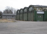 EKVL Airport - The eastern part of Hangar 3 at the closed Vaerloese Air Base in Denmark. The hangar was built in 1936. The wooden storage building in the background was built by the German occupation forces in 1941 and was demolished after the photo was taken. - by Jan Lundsteen-Jensen