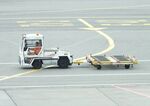 Toulouse Airport, Blagnac Airport France (LFBO) - light tow vehicle with cargo-trailer at Toulouse-Blagnac airport - by Ingo Warnecke