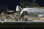 Malta International Airport (Luqa Airport), Luqa Malta (LMML) - Challenge Airlines '4X-ICA' offloading heavy cargo in Malta late at night. Note the use of the nose door. - by Roberto Cassar